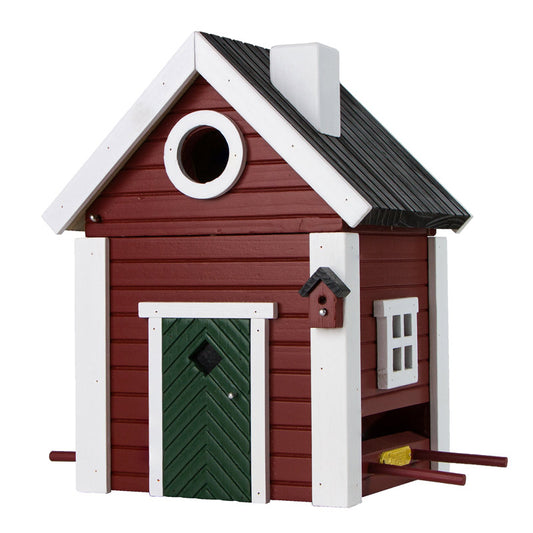 joli nichoir-mangeoire Wildlife Garden en bois peint dont l'architecture rappelle les maisons traditionnelles suédoises