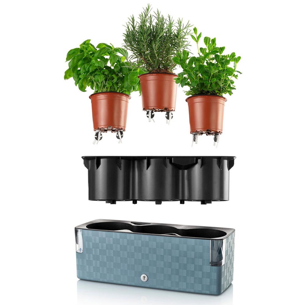 La jardinière auto-arrosante cobble trio bleu metal irrigue vos herbes aromatiques en douceur et en continue