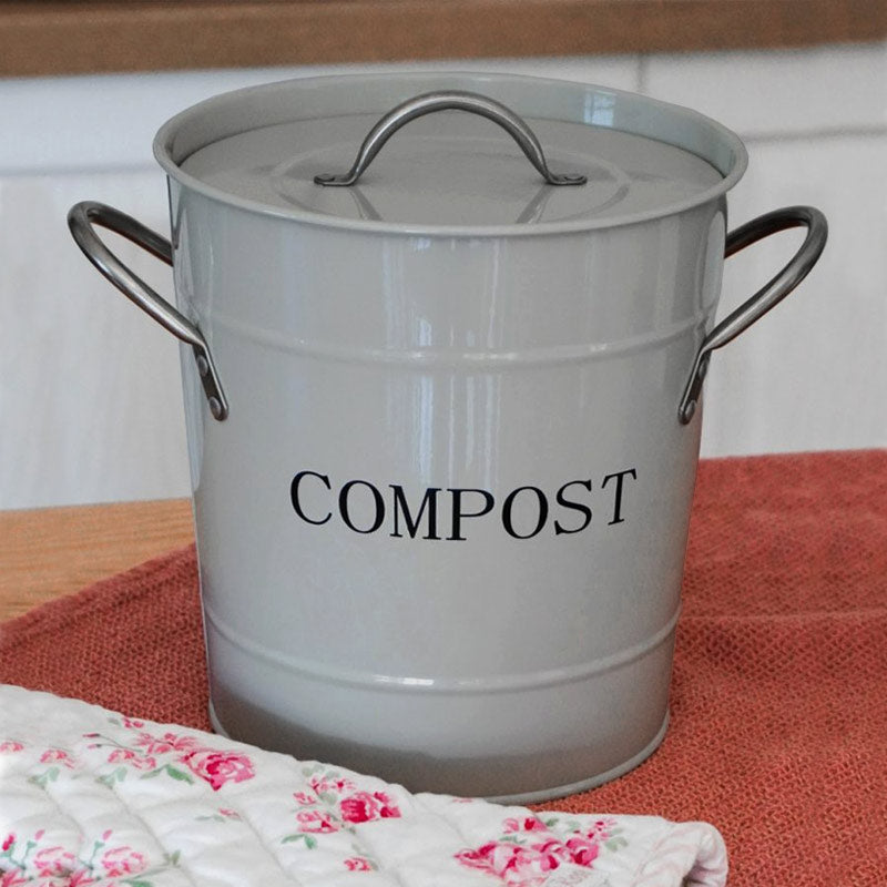 poubelle à compost pour trier facilement les épluchures, bac de couleur gris clair avec écriture noire "Compost"