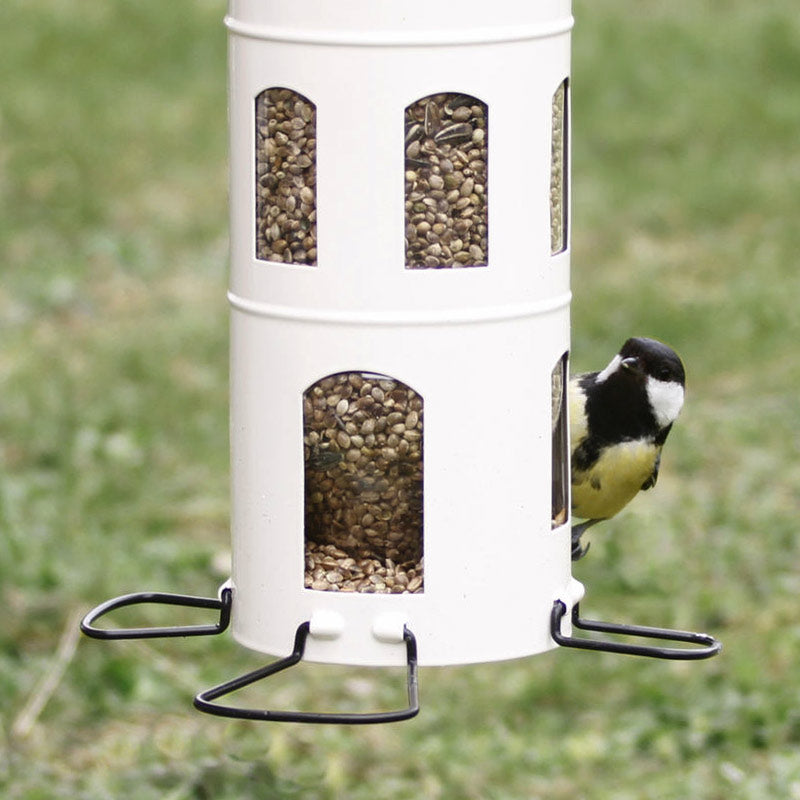 mangeoire distributeur de graines pour les oiseaux comme la mésange, le pinson...