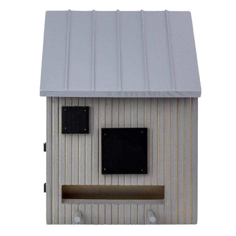 Mangeoire pour oiseaux au design scandinave avec accès à la nourriture des deux côtés et fonction nichoir au printemps